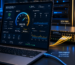 Digital marketer running an accurate internet speed test using an Ethernet cable connected to a high-speed enterprise fiber optic router.